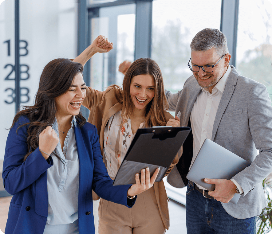 Excited colleagues cheering together